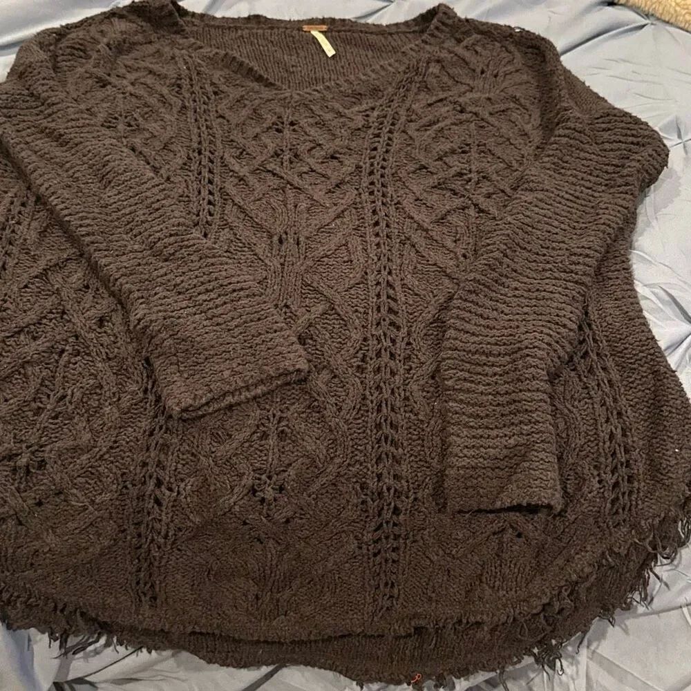 Free people, black sweater, distressed, looking size large